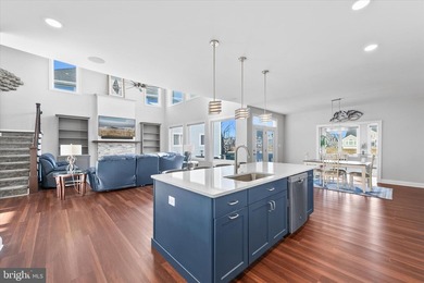 The welcoming covered entry of 33418 Islander Drive invites you on The Peninsula Golf and Country Club in Delaware - for sale on GolfHomes.com, golf home, golf lot