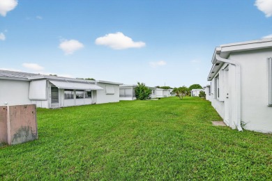 Welcome to Leisureville Living! Step into comfort and on Leisureville Community Golf Course in Florida - for sale on GolfHomes.com, golf home, golf lot