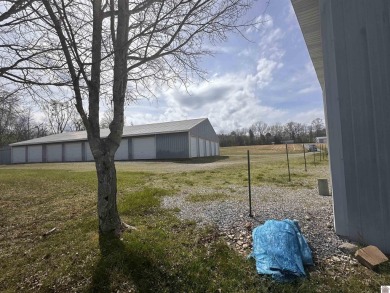 28 storage units on 3.75 acres .  There are 2 storage buildings on Arrowhead Golf Club in Kentucky - for sale on GolfHomes.com, golf home, golf lot