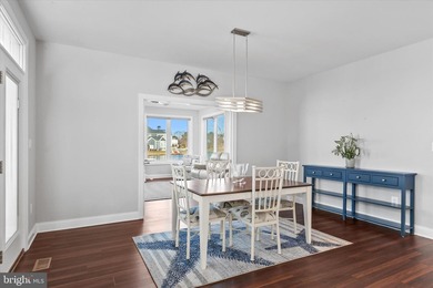 The welcoming covered entry of 33418 Islander Drive invites you on The Peninsula Golf and Country Club in Delaware - for sale on GolfHomes.com, golf home, golf lot