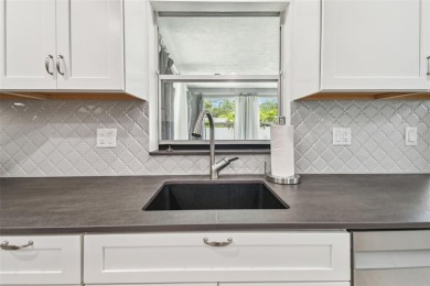 Pride of ownership shines throughout--this home is spotless on The Dunedin Country Club in Florida - for sale on GolfHomes.com, golf home, golf lot