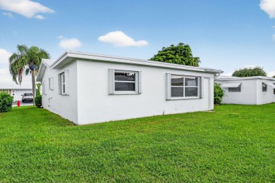 Welcome to Leisureville Living! Step into comfort and on Leisureville Community Golf Course in Florida - for sale on GolfHomes.com, golf home, golf lot