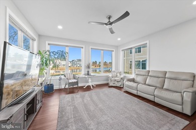 The welcoming covered entry of 33418 Islander Drive invites you on The Peninsula Golf and Country Club in Delaware - for sale on GolfHomes.com, golf home, golf lot