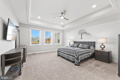 The welcoming covered entry of 33418 Islander Drive invites you on The Peninsula Golf and Country Club in Delaware - for sale on GolfHomes.com, golf home, golf lot