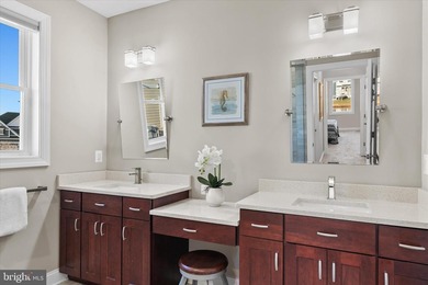 The welcoming covered entry of 33418 Islander Drive invites you on The Peninsula Golf and Country Club in Delaware - for sale on GolfHomes.com, golf home, golf lot