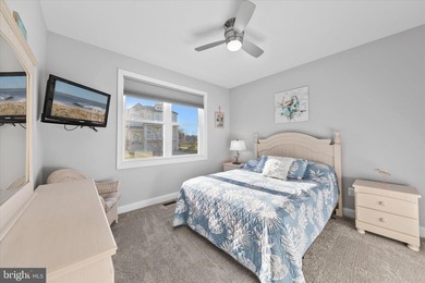 The welcoming covered entry of 33418 Islander Drive invites you on The Peninsula Golf and Country Club in Delaware - for sale on GolfHomes.com, golf home, golf lot