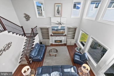 The welcoming covered entry of 33418 Islander Drive invites you on The Peninsula Golf and Country Club in Delaware - for sale on GolfHomes.com, golf home, golf lot