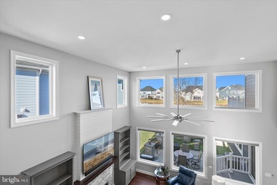 The welcoming covered entry of 33418 Islander Drive invites you on The Peninsula Golf and Country Club in Delaware - for sale on GolfHomes.com, golf home, golf lot