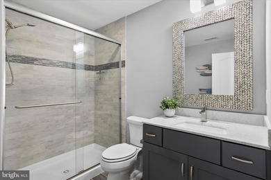 The welcoming covered entry of 33418 Islander Drive invites you on The Peninsula Golf and Country Club in Delaware - for sale on GolfHomes.com, golf home, golf lot