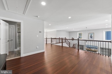 The welcoming covered entry of 33418 Islander Drive invites you on The Peninsula Golf and Country Club in Delaware - for sale on GolfHomes.com, golf home, golf lot