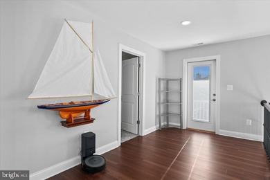 The welcoming covered entry of 33418 Islander Drive invites you on The Peninsula Golf and Country Club in Delaware - for sale on GolfHomes.com, golf home, golf lot