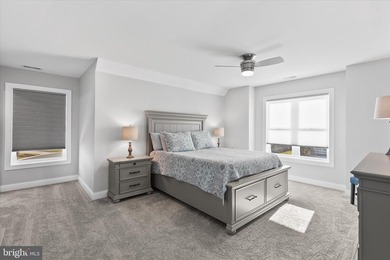 The welcoming covered entry of 33418 Islander Drive invites you on The Peninsula Golf and Country Club in Delaware - for sale on GolfHomes.com, golf home, golf lot