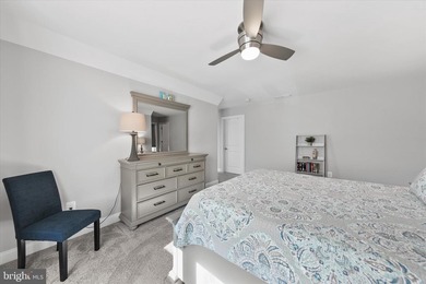 The welcoming covered entry of 33418 Islander Drive invites you on The Peninsula Golf and Country Club in Delaware - for sale on GolfHomes.com, golf home, golf lot