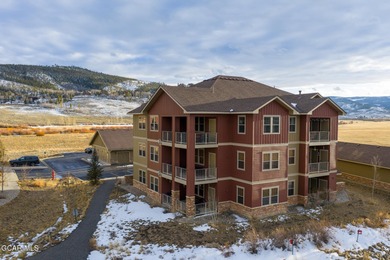 Wake up to panoramic mountain views, spend your days skiing or on Headwaters Golf Course At Granby Ranch in Colorado - for sale on GolfHomes.com, golf home, golf lot