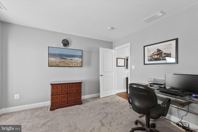 The welcoming covered entry of 33418 Islander Drive invites you on The Peninsula Golf and Country Club in Delaware - for sale on GolfHomes.com, golf home, golf lot