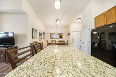 Wake up to panoramic mountain views, spend your days skiing or on Headwaters Golf Course At Granby Ranch in Colorado - for sale on GolfHomes.com, golf home, golf lot