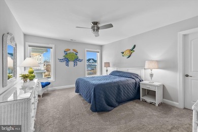 The welcoming covered entry of 33418 Islander Drive invites you on The Peninsula Golf and Country Club in Delaware - for sale on GolfHomes.com, golf home, golf lot