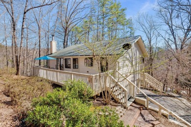 Tucked away in the sought-after Rumbling Bald community, this on Rumbling Bald Resort on Lake Lure in North Carolina - for sale on GolfHomes.com, golf home, golf lot