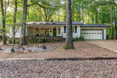 Nestled on a quiet street and surrounded by mature trees, this on DeSoto Golf Course in Arkansas - for sale on GolfHomes.com, golf home, golf lot