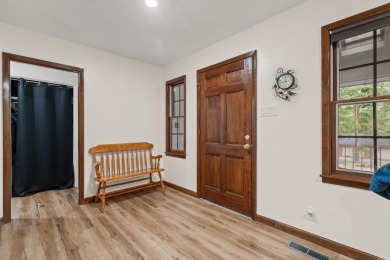 Nestled on a quiet street and surrounded by mature trees, this on DeSoto Golf Course in Arkansas - for sale on GolfHomes.com, golf home, golf lot