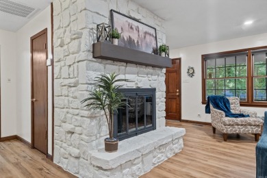Nestled on a quiet street and surrounded by mature trees, this on DeSoto Golf Course in Arkansas - for sale on GolfHomes.com, golf home, golf lot