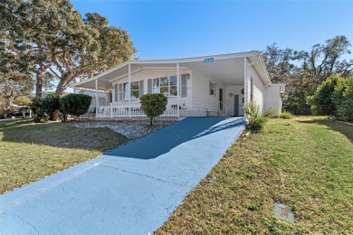 This delightful 2 bedroom 2 bath partially furnished home is in on High Point Golf Club, Inc. in Florida - for sale on GolfHomes.com, golf home, golf lot