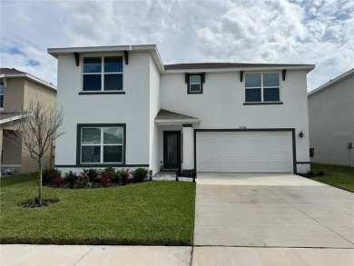 Welcome to this exceptional Zephyr Ridge residence, built in on The Links of Lake Bernadette in Florida - for sale on GolfHomes.com, golf home, golf lot