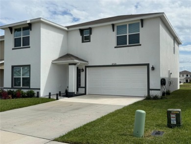 Welcome to this exceptional Zephyr Ridge residence, built in on The Links of Lake Bernadette in Florida - for sale on GolfHomes.com, golf home, golf lot