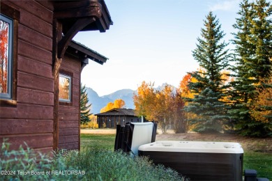 Don't miss this incredible opportunity to own a stunning custom on Jackson Hole Golf and Tennis Club in Wyoming - for sale on GolfHomes.com, golf home, golf lot