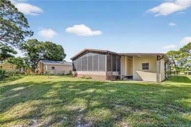 LAND OWNED-NO LAND LEASE! Welcome to 2629 Caper Court in the on Spanish Lakes Golf Village in Florida - for sale on GolfHomes.com, golf home, golf lot