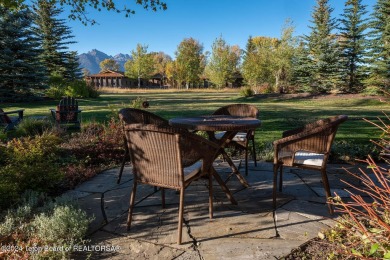 Don't miss this incredible opportunity to own a stunning custom on Jackson Hole Golf and Tennis Club in Wyoming - for sale on GolfHomes.com, golf home, golf lot