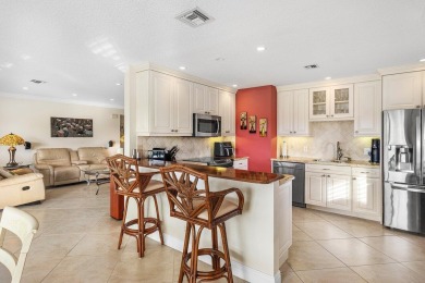 Step into this beautifully updated 2nd floor corner condominium on Quail Ridge Golf Course and Country Club in Florida - for sale on GolfHomes.com, golf home, golf lot