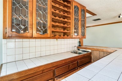 WELCOME TO THIS CHARMING SINGLE-STORY HOME NESTLED ON A on Red Hill Country Club in California - for sale on GolfHomes.com, golf home, golf lot