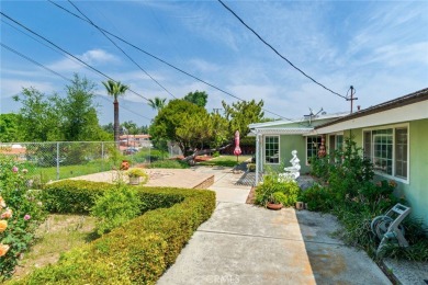 WELCOME TO THIS CHARMING SINGLE-STORY HOME NESTLED ON A on Red Hill Country Club in California - for sale on GolfHomes.com, golf home, golf lot