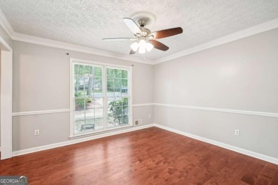 Welcome to this beautiful brick front home nestled on a sweeping on Hidden Hills Country Club in Georgia - for sale on GolfHomes.com, golf home, golf lot