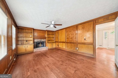 Welcome to this beautiful brick front home nestled on a sweeping on Hidden Hills Country Club in Georgia - for sale on GolfHomes.com, golf home, golf lot
