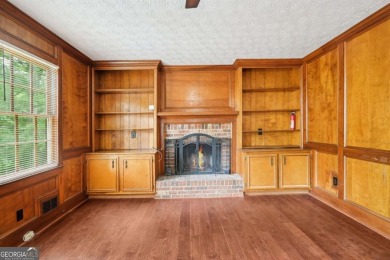 Welcome to this beautiful brick front home nestled on a sweeping on Hidden Hills Country Club in Georgia - for sale on GolfHomes.com, golf home, golf lot