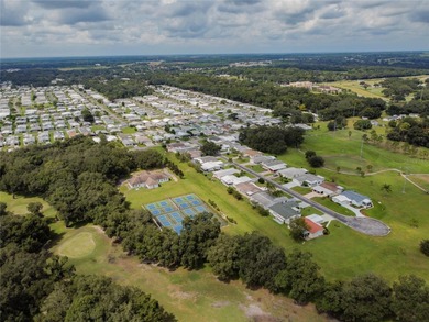 This inviting single-wide home in Betmar Acres, a friendly 55+ on Betmar Acres Golf Club in Florida - for sale on GolfHomes.com, golf home, golf lot
