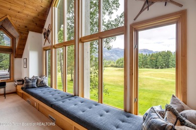 Bordering the 11th fairway of the prestigious Teton Pines golf on Teton Pines Golf Club in Wyoming - for sale on GolfHomes.com, golf home, golf lot