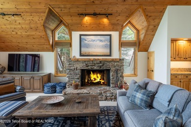 Bordering the 11th fairway of the prestigious Teton Pines golf on Teton Pines Golf Club in Wyoming - for sale on GolfHomes.com, golf home, golf lot