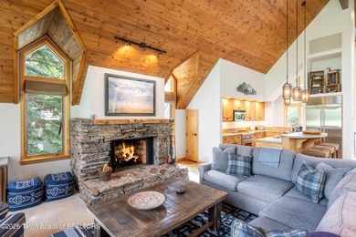 Bordering the 11th fairway of the prestigious Teton Pines golf on Teton Pines Golf Club in Wyoming - for sale on GolfHomes.com, golf home, golf lot