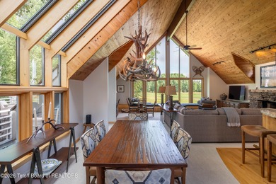 Bordering the 11th fairway of the prestigious Teton Pines golf on Teton Pines Golf Club in Wyoming - for sale on GolfHomes.com, golf home, golf lot