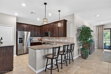 Live your vacation dream in this 2 Bedroom plus a Den with 2 on Panther Run Golf Club in Florida - for sale on GolfHomes.com, golf home, golf lot