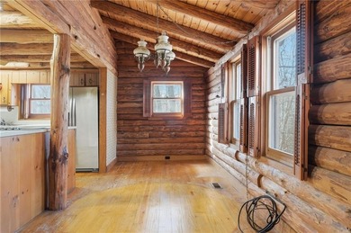 This Authentic Log Cabin Kept in It's Original Condition on The Highlands Course at Lake Arrowhead in Georgia - for sale on GolfHomes.com, golf home, golf lot