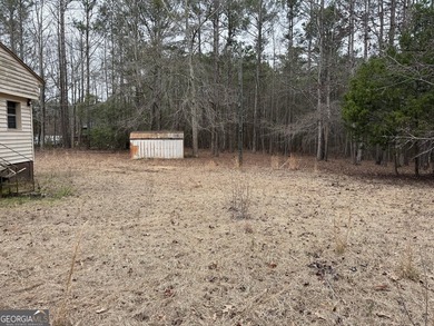 Opportunity awaits at 707 Pebblebrook Road in Woodbury on Pebblebrook Golf Club in Georgia - for sale on GolfHomes.com, golf home, golf lot