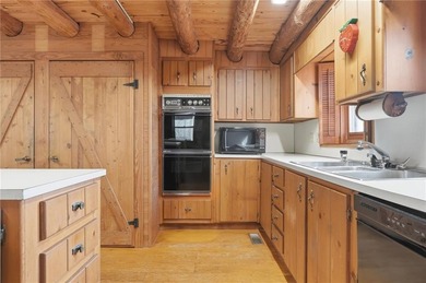 This Authentic Log Cabin Kept in It's Original Condition on The Highlands Course at Lake Arrowhead in Georgia - for sale on GolfHomes.com, golf home, golf lot