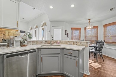 Don't miss this beautifully updated home offering a 3-car garage on Bella Vista - Metfield Golf Complex and Country Club in Arkansas - for sale on GolfHomes.com, golf home, golf lot