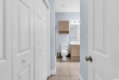This furnished 3-bedroom, 2-bath condo offers beach living at on Myrtlewood Golf Course and Club  in South Carolina - for sale on GolfHomes.com, golf home, golf lot