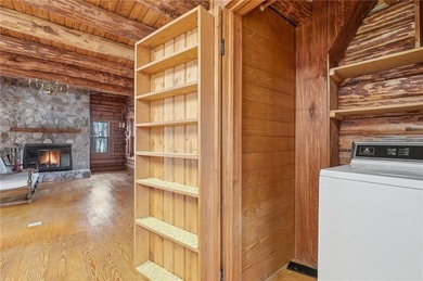 This Authentic Log Cabin Kept in It's Original Condition on The Highlands Course at Lake Arrowhead in Georgia - for sale on GolfHomes.com, golf home, golf lot