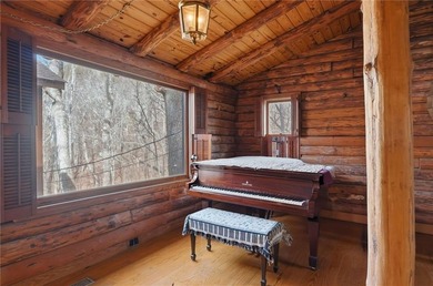 This Authentic Log Cabin Kept in It's Original Condition on The Highlands Course at Lake Arrowhead in Georgia - for sale on GolfHomes.com, golf home, golf lot